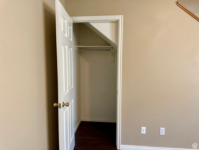 View of coat closet set in the living room | Image 23