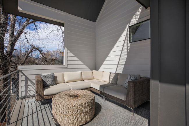 Wooden terrace featuring an outdoor living space | Image 36
