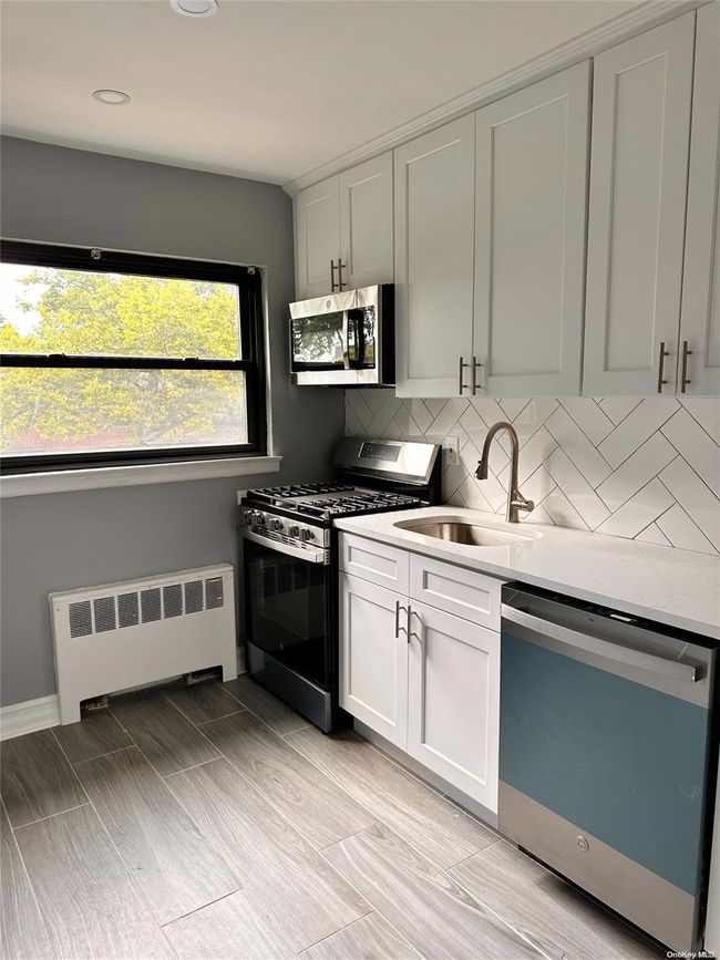 2 - 219-50 74 Th Ave, Home with 2 bedrooms, 1 bathrooms and 2 parking in Bayside NY | Image 5