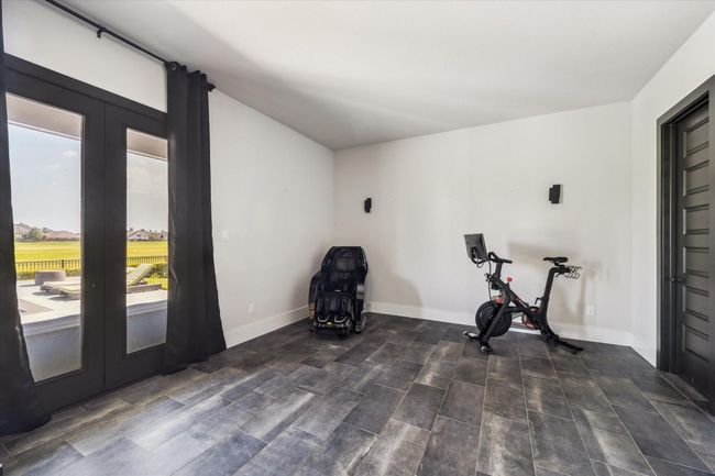Media room with a Jack & Jill bathroom connecting to the 3rd bedroom. | Image 20