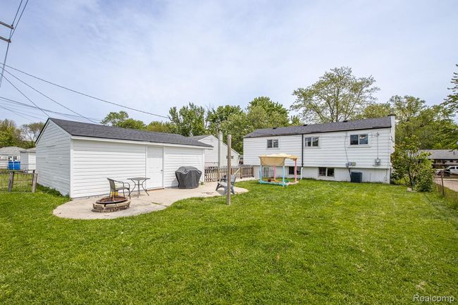 Great fenced yard for the kids & pets | Image 24