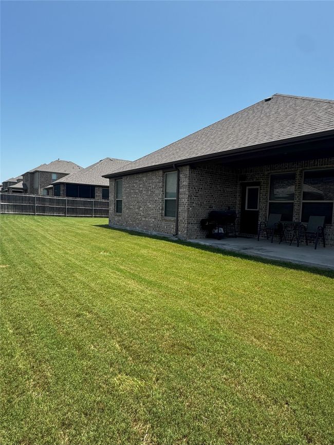 View of yard with a patio area | Image 28