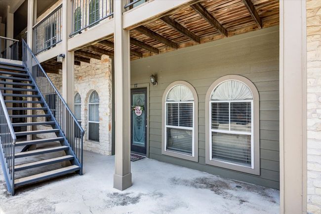 Property entrance with stone siding | Image 17
