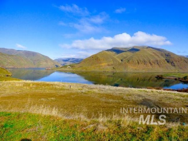 Mountain view featuring a large body of water | Image 37
