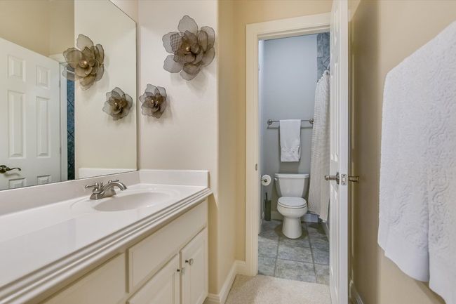 UPSTAIRS Jack-n-Jill Bathroom with separate vanity areas and toilet. | Image 23