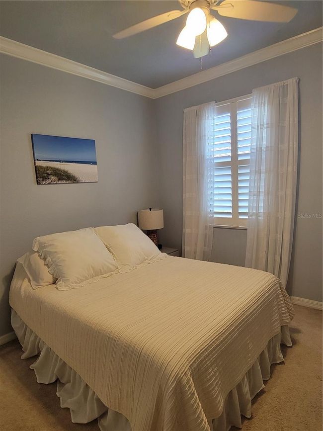 Guest Bedroom with planation shutters | Image 19