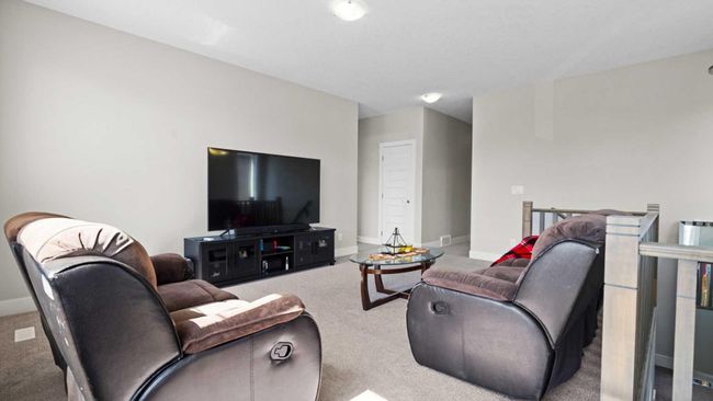 612 Windrow Manor Sw, Home with 4 bedrooms, 2 bathrooms and 4 parking in Airdrie AB | Image 19