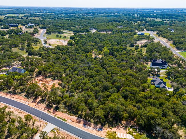 Aerial view of a heavily wooded area | Image 27