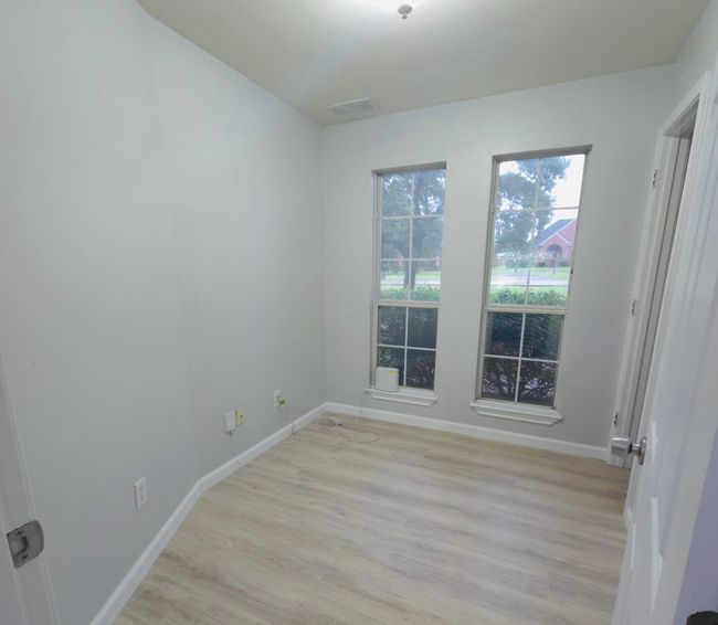 Bedroom 6, Small bedroom or office. with light wood-style floors and baseboards | Image 30