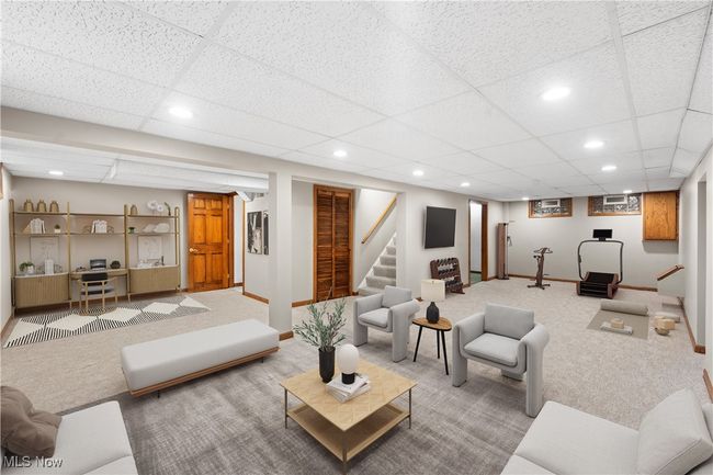 Living room featuring carpet floors and a drop ceiling | Image 22