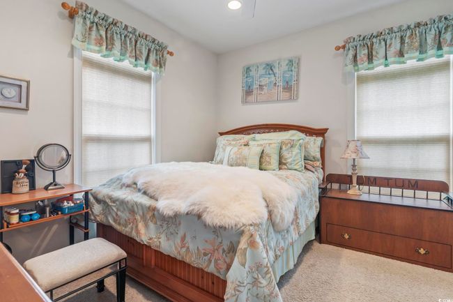 Bedroom featuring carpet flooring, recessed lighting, and ceiling fan | Image 7