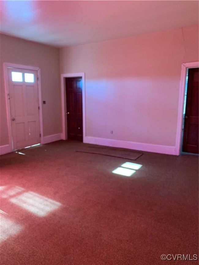 Foyer entrance featuring dark colored carpet | Image 11