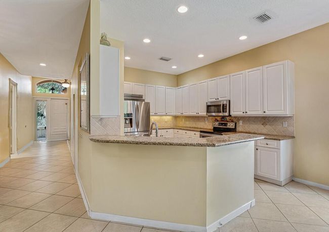 7562 Starfish Reef Ln, House other with 3 bedrooms, 2 bathrooms and null parking in Lake Worth FL | Image 13