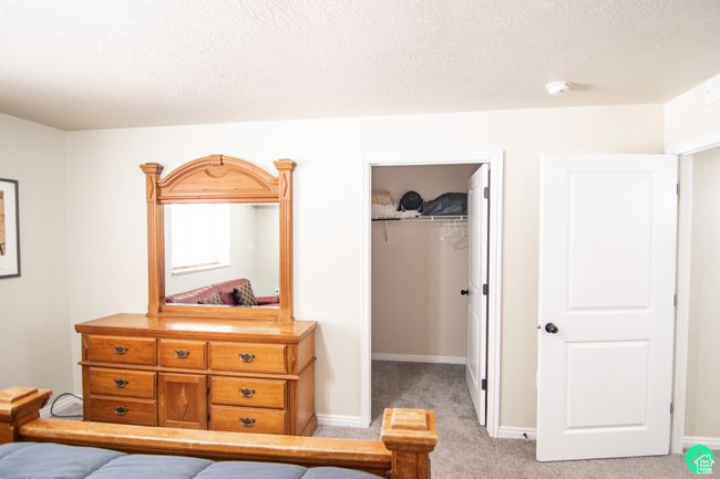 Bedroom with a walk in closet | Image 19