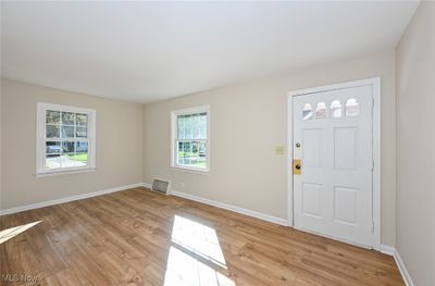 Living Room featuring light wood-type flooring | Image 3