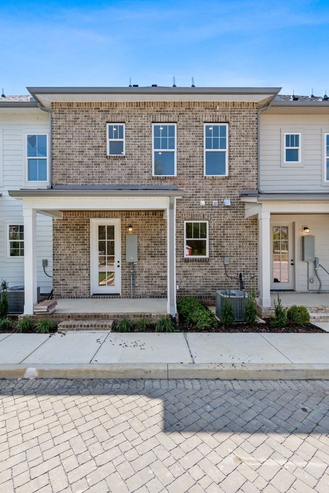 Another view of your back porch and the rear side of your home! Actual photo of home. | Image 39
