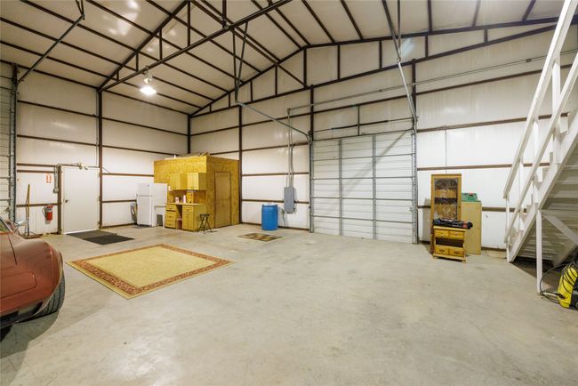 Garage with freestanding refrigerator | Image 6