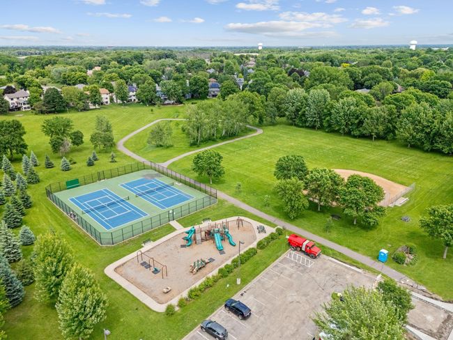 This location is unbeatable. Close to parks, trails, shops, restaurants, and Elm Creek Park Reserve. | Image 41