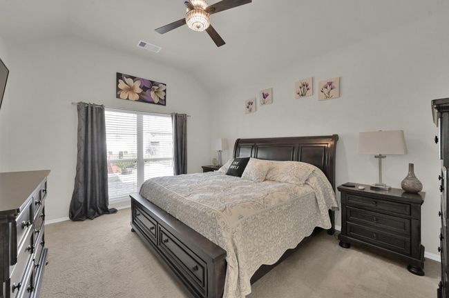 Welcome to your primary retreat! With high ceilings and tall windows, you'll be living large. | Image 15