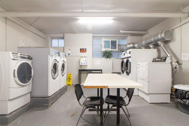 Community laundry room with independent washer and dryer | Image 14