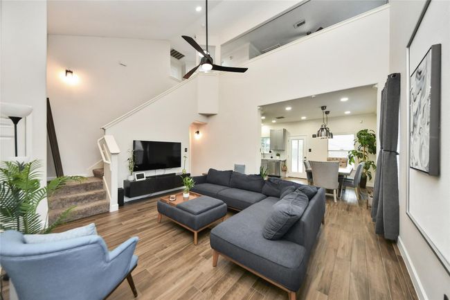 Enjoy the spacious, bright living area. | Image 4