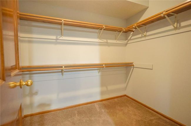 Walk in closet in Primary Bedroom | Image 25