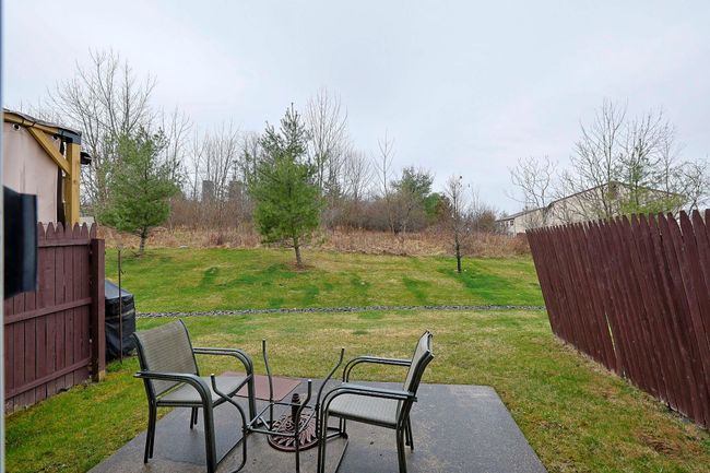 View of yard featuring a patio and fence | Image 18