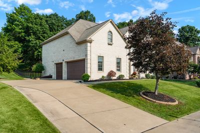 Plenty of parking in the 3 car attached garage and spacious driveway | Image 2