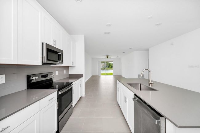 1596 Contentment Loop, House other with 3 bedrooms, 2 bathrooms and null parking in KISSIMMEE FL | Image 7
