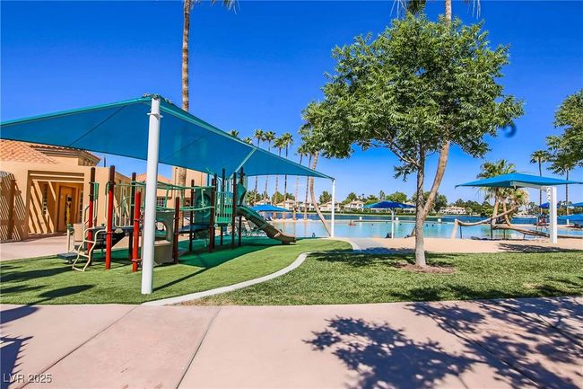 Community play area featuring a lawn | Image 51