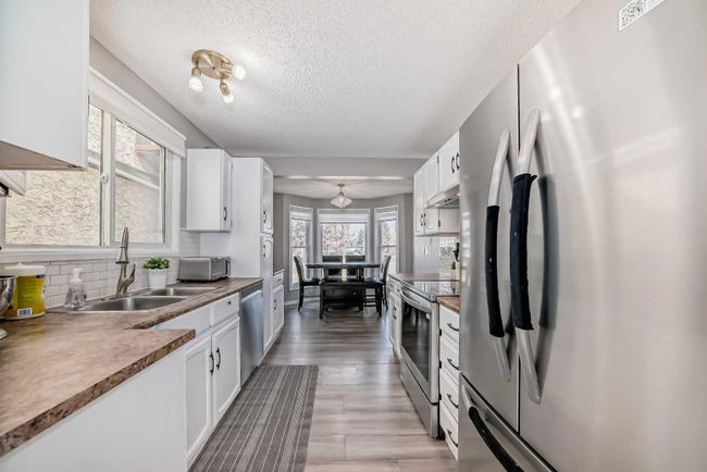 59 Castlegrove Road Ne, Home with 3 bedrooms, 1 bathrooms and 2 parking in Calgary AB | Image 10