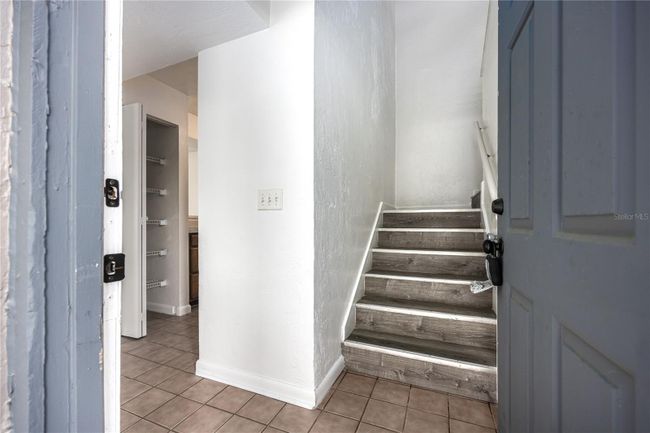 Front Entry, showing stairs leading upstairs | Image 7