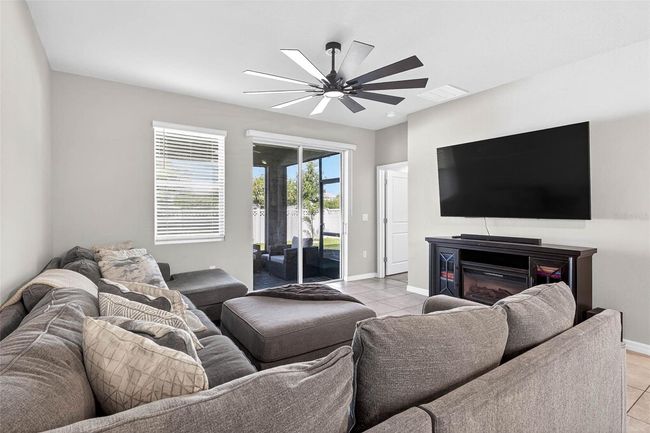 Living room looking out toward the back yard. | Image 12
