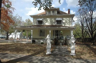 View of front of home with a porch and patio | Image 1