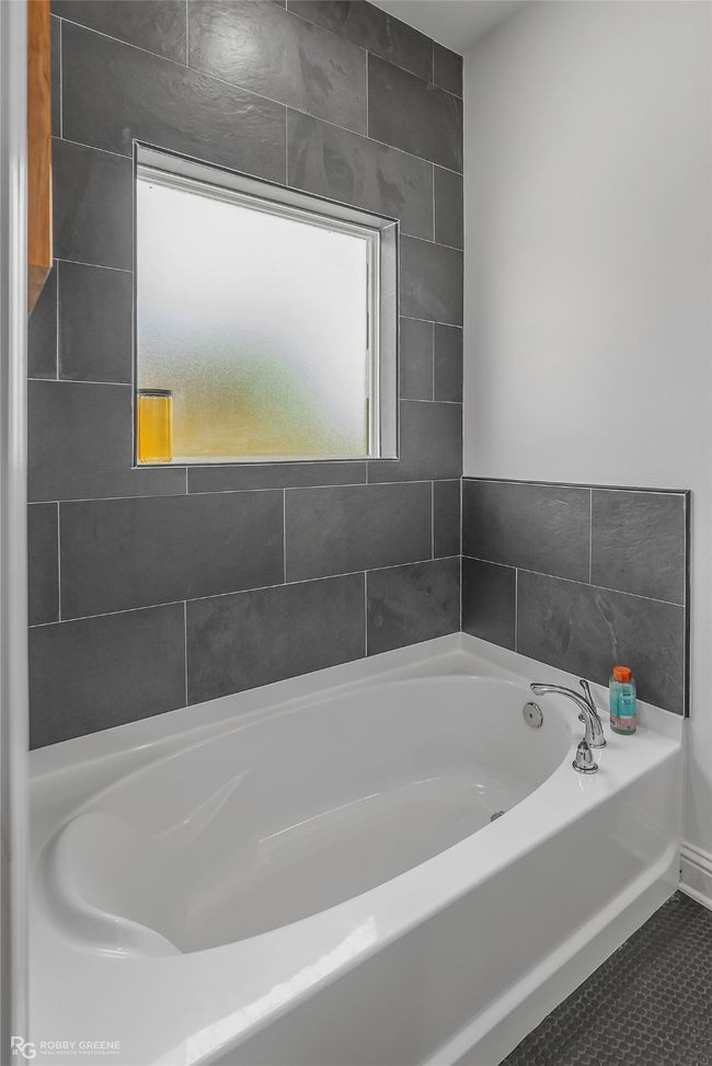 Full bath with a garden tub and tile patterned flooring | Image 17