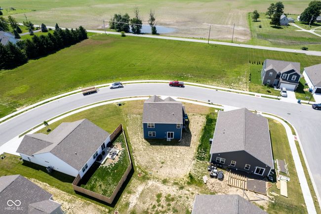 view of rural area featuring a large body of water and nearby suburban area | Image 43