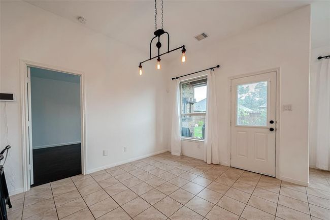 Dining space has great views to back yard | Image 26
