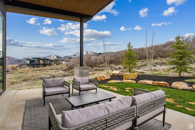 View of patio featuring outdoor lounge area and a mountain view | Image 59