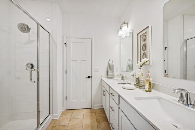Photo is of the actual model. Another view of the primary bath. | Image 12
