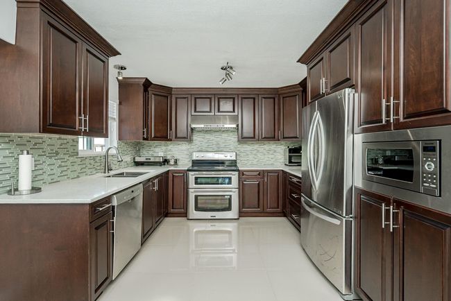 6074 Sherbrooke St, House other with 6 bedrooms, 4 bathrooms and 2 parking in Vancouver BC | Image 7