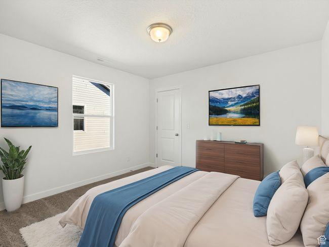 Bedroom featuring carpet flooring and baseboards | Image 6