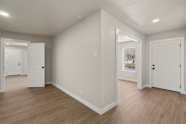 Entryway with light wood-type flooring, baseboards, and recessed lighting | Image 4