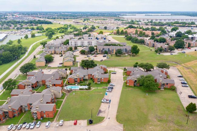 View of property location featuring a nearby body of water and nearby suburban area | Image 34