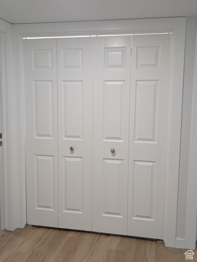 View of washer and dryer area closed | Image 26