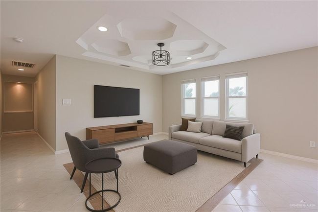 Living room with light tile patterned flooring, baseboards, visible vents, and recessed lighting | Image 18
