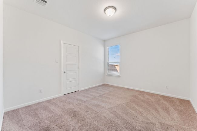Unfurnished room featuring baseboards, visible vents, and light carpet | Image 16