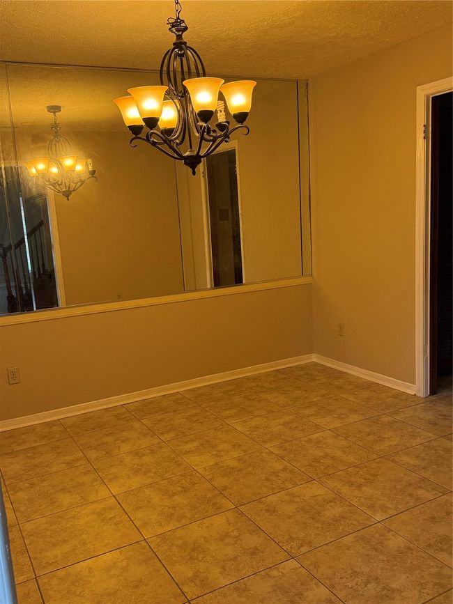 Conveniently located across from the pool, tennis courts and club house. | Image 36