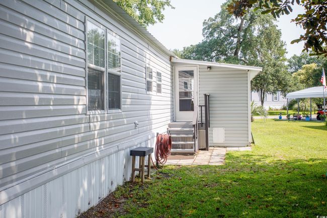 Back of property featuring a yard | Image 30