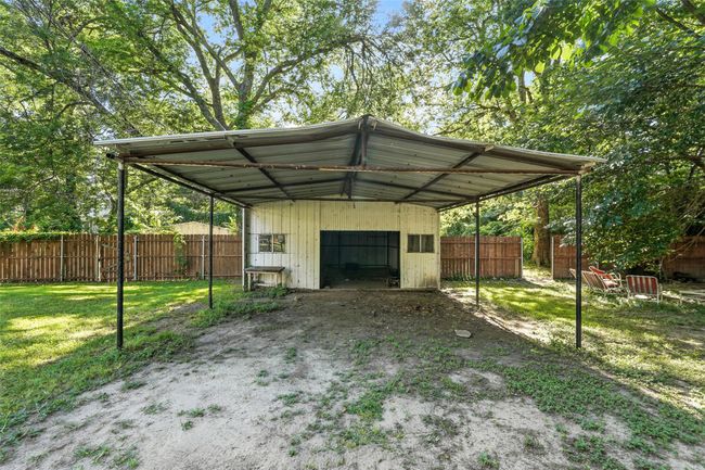 View of outdoor structure featuring a carport | Image 7