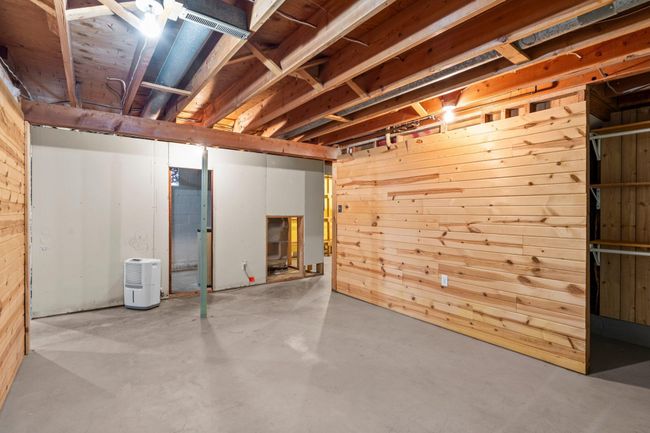 The partially finished basement offers a versatile space with endless possibilities for additional living areas. | Image 10